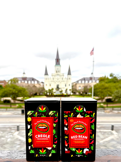 Two containers of Creole and Red Bean seasonings with a background featuring a church and an American flag.